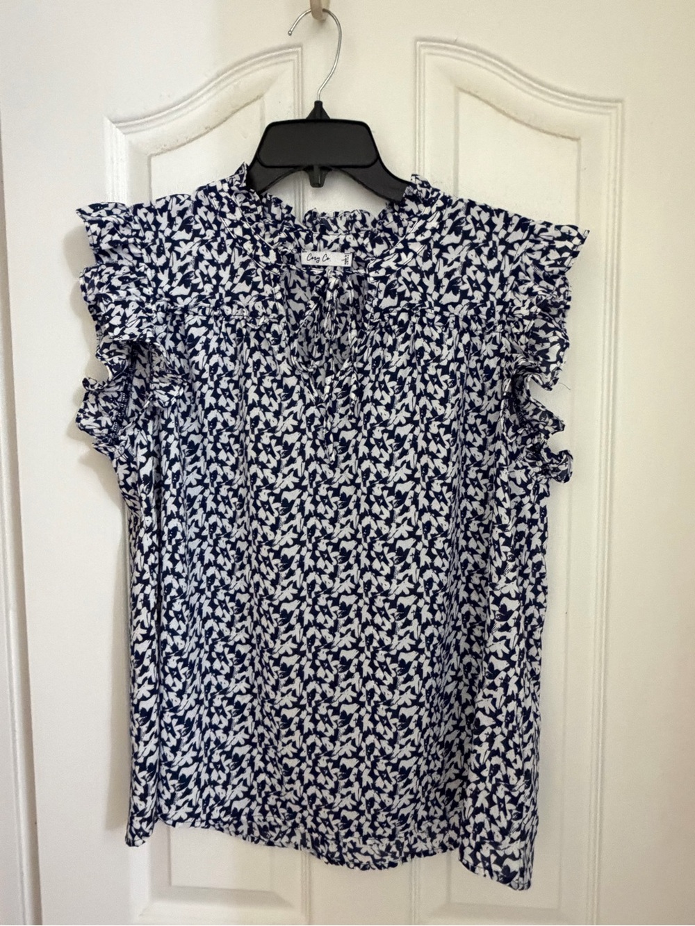 💙 4 for $40 💙 Navy and White Ruffled Sleeveless tie-neck Blouse